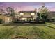 The large backyard features a wooden deck, ideal for relaxation and gatherings at 941 Law Ln, Mount Pleasant, SC 29464