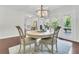 Cozy dining room featuring a round table with seating and large french doors to the outdoor deck at 941 Law Ln, Mount Pleasant, SC 29464