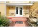 Charming front porch with seating area and well-maintained landscaping at 941 Law Ln, Mount Pleasant, SC 29464