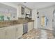 Bright kitchen featuring granite countertops, stainless steel appliances, and a mosaic tile backsplash at 941 Law Ln, Mount Pleasant, SC 29464