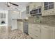 Stylish kitchen with stainless steel appliances, granite counters, and tiled backsplash at 941 Law Ln, Mount Pleasant, SC 29464