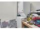 Functional laundry area with a stacked washer and dryer, storage space, and counter at 941 Law Ln, Mount Pleasant, SC 29464