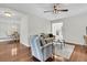 Spacious living room with hardwood floors, comfortable seating, and access to an outdoor area at 941 Law Ln, Mount Pleasant, SC 29464