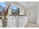 Bright staircase features large windows with a view of the outdoors and modern lighting at 941 Law Ln, Mount Pleasant, SC 29464