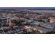 Stunning aerial view of Charleston showcasing historic architecture and waterfront views at dusk at 100 Queen St, Charleston, SC 29401