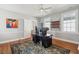 Spacious office with a large desk, ample lighting, and neutral colors at 100 Queen St, Charleston, SC 29401