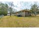 View of backyard with lush lawn and perimeter fencing at 105 New Ct, Summerville, SC 29483