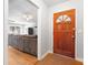 Inviting entryway showcasing a warm wooden door and a glimpse into the living space at 105 New Ct, Summerville, SC 29483