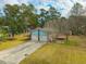 Charming home showcasing a two-car garage and well-manicured front yard at 105 New Ct, Summerville, SC 29483