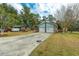 Residential home with a two-car garage and a long driveway at 105 New Ct, Summerville, SC 29483