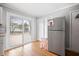 Cozy eat-in kitchen with sliding glass door to the outdoor patio at 105 New Ct, Summerville, SC 29483