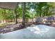 Spacious backyard with a large patio and a privacy fence, perfect for outdoor entertaining at 108 Nightingale Manor, North Charleston, SC 29418