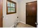 The laundry room has a window, connections, and access to the exterior of the home at 108 Nightingale Manor, North Charleston, SC 29418