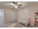 Charming Bedroom featuring soft pink walls, a white crib, and a cozy chair, perfect for a new baby at 109 Forest Springs Rd, Moncks Corner, SC 29461