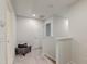 Hallway featuring neutral walls and carpet, illuminated by recessed lighting, offering a clean and bright space at 109 Forest Springs Rd, Moncks Corner, SC 29461