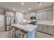 Modern kitchen with granite island, stainless steel appliances, and ample cabinet space at 109 Forest Springs Rd, Moncks Corner, SC 29461