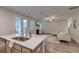 Open concept kitchen showcasing sink, stainless steel appliances, and view into the living area at 109 Forest Springs Rd, Moncks Corner, SC 29461