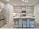 Kitchen with island, bar seating, stainless steel appliances, and pendant lighting at 109 Forest Springs Rd, Moncks Corner, SC 29461