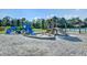 Community playground with slides, swings, and a sandbox for to enjoy at 109 Forest Springs Rd, Moncks Corner, SC 29461