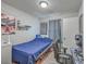 This bedroom features bright walls, hardwood floors, and a comfortable bed at 111 Summit Ave, Goose Creek, SC 29445