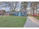 Charming home with well-maintained lawn and driveway at 111 Summit Ave, Goose Creek, SC 29445