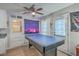 Recreation area with a pool table, offering an entertainment space and dual exit doors to the exterior of the home at 111 Summit Ave, Goose Creek, SC 29445