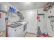 This laundry room features new appliances and ample storage space at 111 Summit Ave, Goose Creek, SC 29445