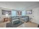 Comfortable living room with modern decor, plush sofas, and soft lighting, ideal for relaxation and entertainment at 111 Summit Ave, Goose Creek, SC 29445