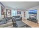 Cozy living area featuring comfortable seating, stylish decor, and ample natural light, creating a welcoming atmosphere at 111 Summit Ave, Goose Creek, SC 29445