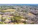 Beautiful aerial view of the real estate with a mixture of trees and open land at 117 Roberts Rd, Summerville, SC 29483