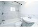 Updated bathroom with marble tile and modern fixtures at 117 Roberts Rd, Summerville, SC 29483