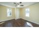 Bright bedroom with ceiling fan and closet, providing ample natural light at 117 Roberts Rd, Summerville, SC 29483