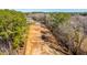 Cleared lot surrounded by lush trees, showcasing an ideal setting for a new home build at 117 Roberts Rd, Summerville, SC 29483