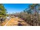 Expansive cleared lot, primed for building, with surrounding trees and neighborhood views at 117 Roberts Rd, Summerville, SC 29483