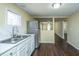 Bright kitchen with stainless steel appliances and white marble countertops at 117 Roberts Rd, Summerville, SC 29483