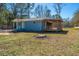 The back of this bungalow features a cozy outdoor deck, perfect for relaxing or entertaining at 117 Roberts Rd, Summerville, SC 29483