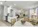 Inviting open-concept layout with a combined living, dining, and kitchen area, great for entertaining at 1225 Blakeway St # 1104, Daniel Island, SC 29492