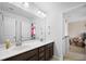 Spacious bathroom with double sinks and dark wood cabinetry at 136 Stagecoach Ln, Summerville, SC 29483