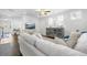 Cozy living room featuring neutral furniture, hardwood floors, and a ceiling fan at 136 Stagecoach Ln, Summerville, SC 29483