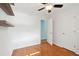 Bright bedroom with hardwood floors, an open door, and closet at 1491 Seacroft Rd, James Island, SC 29412