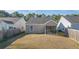 Spacious backyard with a screened-in porch and plenty of room to play at 152 Coosawatchie St, Summerville, SC 29485