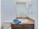 Bathroom featuring dark wood vanity, a round sink, and modern fixtures at 152 Coosawatchie St, Summerville, SC 29485