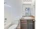 Well-lit bathroom with a shower-tub combo and vanity with ample storage space at 152 Coosawatchie St, Summerville, SC 29485