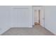 Bedroom features plush carpet, large closet, and doorway to another room at 152 Coosawatchie St, Summerville, SC 29485
