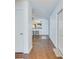 Inviting hallway with sleek hardwood floors leading to open living spaces and natural light at 152 Coosawatchie St, Summerville, SC 29485