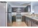 Well-equipped kitchen with stainless steel appliances and ample counter space for meal preparation at 152 Coosawatchie St, Summerville, SC 29485