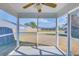 View from screened-in porch of backyard with lots of sunlight and lush lawn at 152 Coosawatchie St, Summerville, SC 29485
