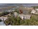 Aerial view of condo complex surrounded by mature trees and close to tennis courts at 2012 Long Bend Drive, Seabrook Island, SC 29455