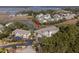 Aerial view of condo complex surrounded by trees, marshes, and waterfront at 2012 Long Bend Drive, Seabrook Island, SC 29455