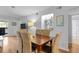 Dining area with a dark wood table and seating, with convenient access to the kitchen and living areas at 2012 Long Bend Drive, Seabrook Island, SC 29455